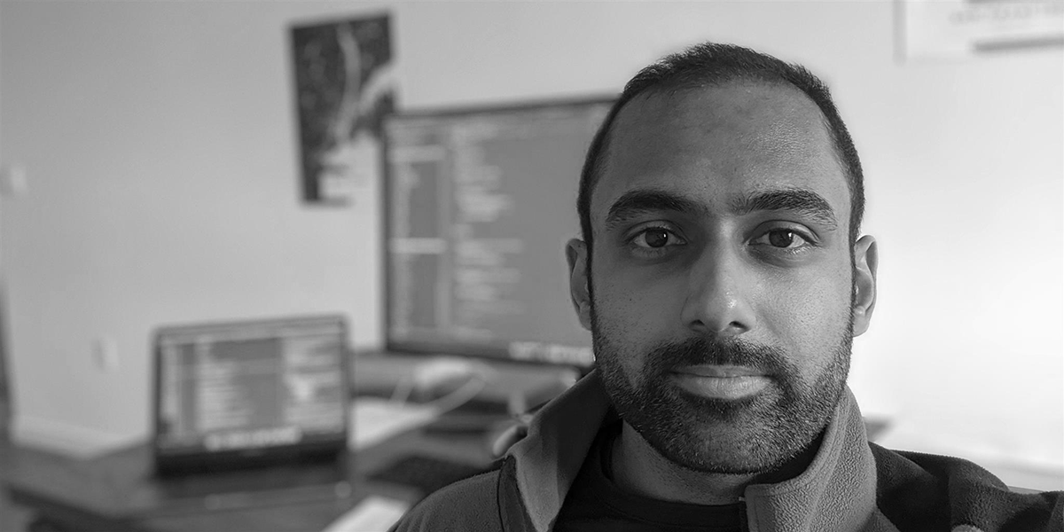 In Focus: Drive Sales Using 3D Modeling with Shopify Expert Sahil Gupta sahil gupta standing in front of a computer for 3D modeling.